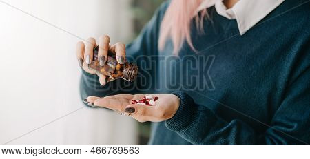Woman Depression Holding Bottle With Pills On Hand Going To Take Medicaments Prescribed By His Physi