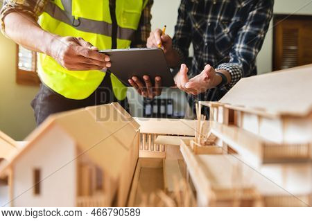 Engineer Meeting For Architectural Project Or Architecture Discussing And Working On Blueprint With 