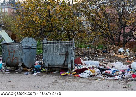 Belgrade, Serbia - November 17, 2022: Garbage Pile Beside Dumpster Scattered All Over The Street In