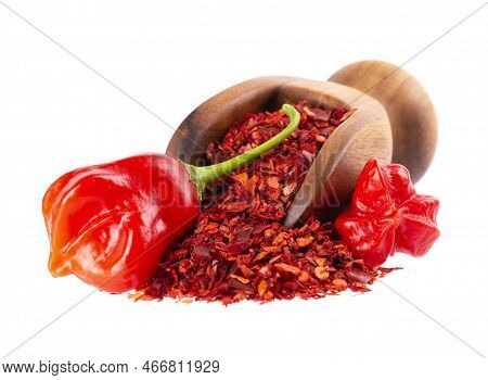 Fresh And Dry Ground Red Chili Peppers Isolated On White Background. Capsicum Baccatum Or Bishop's C