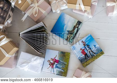A Photobook Of Family.photobook Is Gift. Photo Album Next To Gifts