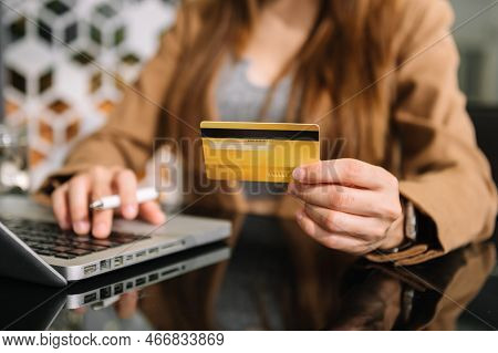 Business Woman Hands Using Smartphone And Holding Credit Card With Digital Layer Effect Diagram As O