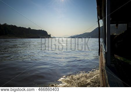 Travelling The Mekong River Bordering Laos And Thailand By Slow Boat