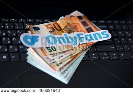 Ternopil, Ukraine - September 6, 2022 Onlyfans Paper Logotype On Bunch Of Euro Bills Lies On Black L