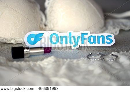Ternopil, Ukraine - September 6, 2022 Onlyfans Paper Logotype Among Lipstick, Earrings And Women Lin