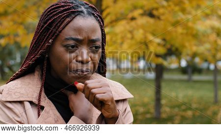 Close-up Young African American Woman Standing Outdoors Coughing Holding Neck Suffering From Sore Th