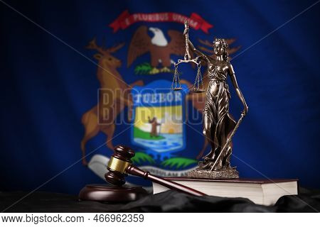 Michigan Us State Flag With Statue Of Lady Justice, Constitution And Judge Hammer On Black Drapery. 