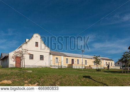 Elim, South Africa - Sep 21, 2022: A Street Scene, With An Historic Building, In Elim, In The Wester