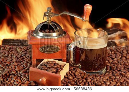 Hot Mug Of Coffee By The Fire