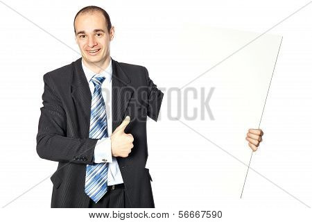 Man Shows Off The Poster.