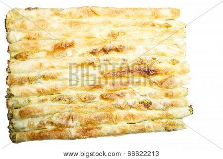Homemade Pie Set In Lines Filled With Cheese And Spinach