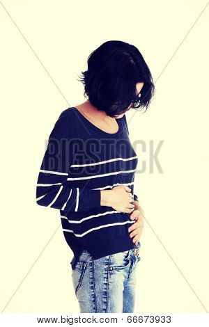 Young woman with stomach issues.