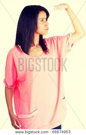 Young woman looking farr away.