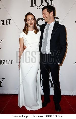 NEW YORK-JUNE 8: Actors Leighton Meester (L) and husband Adam Brody attend American Theatre Wing's 68th Annual Tony Awards at Radio City Music Hall on June 8, 2014 in New York City.