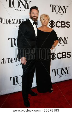 NEW YORK-JUNE 8: Actor Hugh Jackman (L) and wife  Deborra-Lee Furness attend American Theatre Wing's 68th Annual Tony Awards at Radio City Music Hall on June 8, 2014 in New York City.