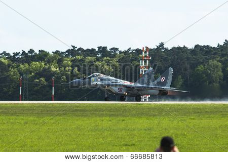 BERLIN, GERMANY - MAY 20, 2014: Jet fighter Mikojan-Gurewitsch MiG-29 (Polish Air Force) demonstration during the International Aerospace Exhibition ILA Berlin Air Show-2014.