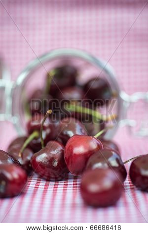Glass Storage Jar Full Of Fresh Cherries