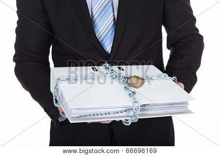 Businessman Holding A Top Secret File