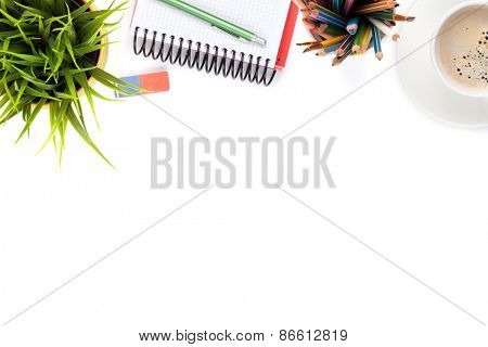 Office desk table with supplies, coffee cup and flower. Isolated on white background. Top view with copy space