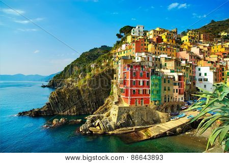 Riomaggiore Village, Rocks And Sea At Sunset. Cinque Terre, Ligury, Italy