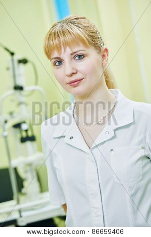 Ophthalmology. portrait of female optometrist optician doctor in eye correction medic clinic 