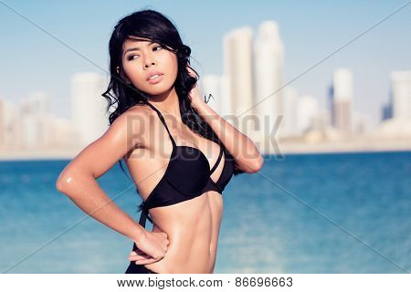 Sexy tourist girl in Dubai city beach