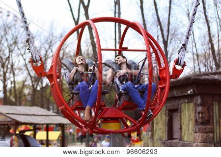 Cheerful couple preparing for the flight to attraction