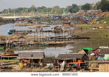 Slum village near the river in the Mandalay city in Myanmar (Burma)