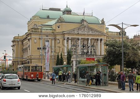 RIJEKA CROATIA - OCTOBER 17: National Theatre Ivan Zajc in Rijeka on OCTOBER 17 2014. Croatian and Italian Drama Opera and Ballet Activity in Classics Style Building in Rijeka Croatia.