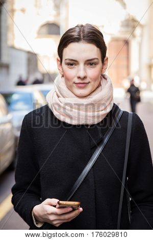 MILAN ITALY - FEBRUARY 25: Beautiful model poses outside Blumarine fashion show during Milan Women's Fashion Week on FEBRUARY 25 2017 in Milan.