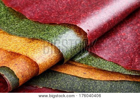 Tklapi - dried mashed fruit pulp / Colorful fruit leather from apricot kiwi dogwood. Georgian and Armenian cuisine.