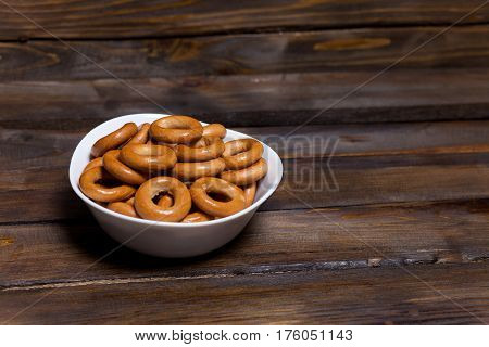 Russian Bagels, Bread In A White Plate On Wooden Background