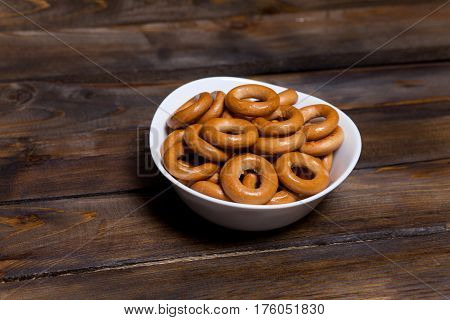 Russian Bagels, Bread In A White Plate On Wooden Background