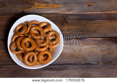 Russian Bagels, Bread In A White Plate On Wooden Background