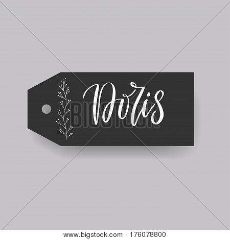 Doris - common female first name on a tag, perfect for seating card usage. One of wide collection in modern calligraphy style.
