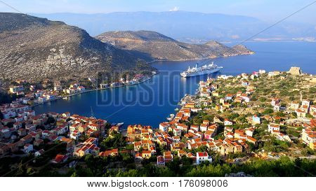 The port of Kastellorizo, a tiny Greek island south of Turkey, with the MV Thomson Spirit anchored in the bay.