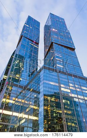 Two high towers skyscraper glass high city.