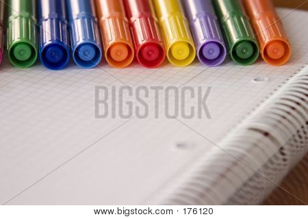 Canetas e papel