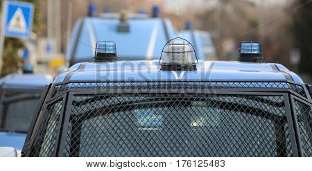 Convoy With Several Police Cars And Armored Vehicles