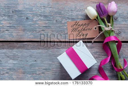Mothers day gift flowers with blank label and decorative ribbon