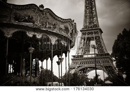 PARIS, FRANCE - MAY 13: Carrousel and Eiffel Tower on May 13, 2015 in Paris. With the population of 2M, Paris is the capital and most-populous city of France