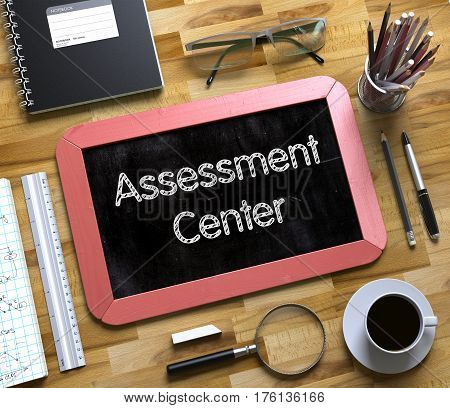Top View of Office Desk with Stationery and Red Small Chalkboard with Business Concept - Assessment Center. Assessment Center Handwritten on Small Chalkboard. 3d Rendering.