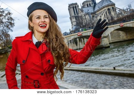 Traveller Woman On Embankment In Paris, France Handwaving
