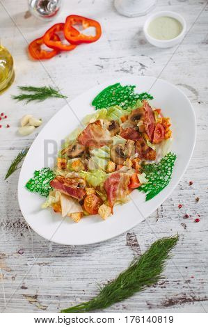 Salad With Bacon Mushrooms Greens And Cherry