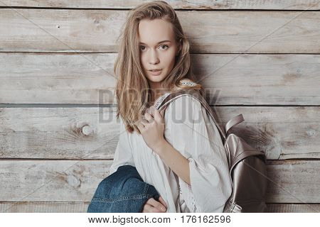 Close up fashion lifestyle portrait of young pretty woman in wooden room. Processed with VSCO f3 preset