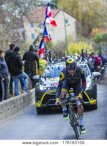 Conflans-Sainte-HonorineFrance-March 62016: The French cyclist Angelo Tulik of Direct Energie Team riding during the prologue stage of Paris-Nice 2016.