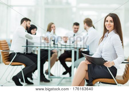 leading lawyer of the company on background, business meeting business partners. the photo has a empty space for your text.