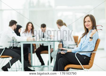 leading lawyer of the company on background, business meeting business partners. the photo has a empty space for your text.