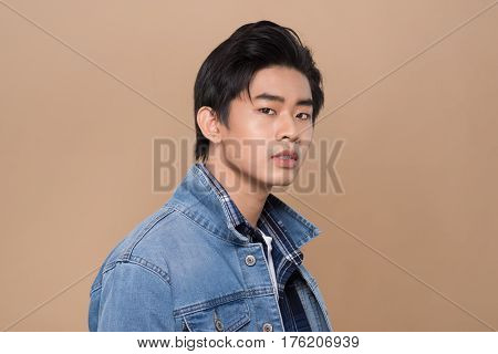 Elegant young handsome asian man. Cool fashion male model.