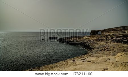 Sea view to Azure window natural arch, now vanished, Gozo island Malta